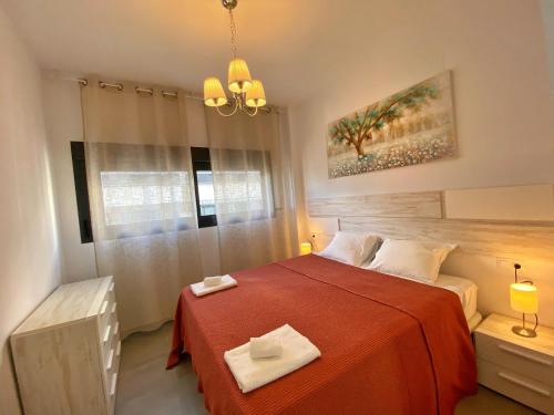 Postel nebo postele na pokoji v ubytování Calpe Beach Family Suite