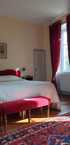 Postel nebo postele na pokoji v ubytování Château de Colombier