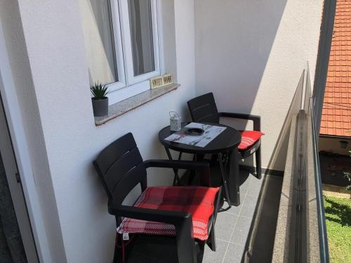 En sittgrupp på Apartman SIMS