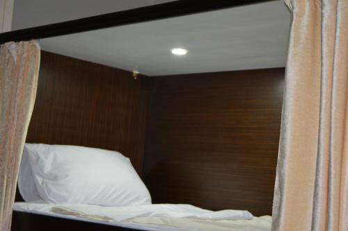 Cama o camas de una habitación en Heritage Hostel Cairo