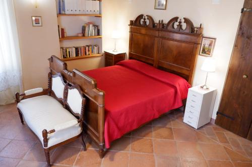 Łóżko lub łóżka w pokoju w obiekcie Alla Locanda Del Cinquecento