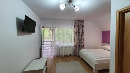 Postel nebo postele na pokoji v ubytování Casa Balint