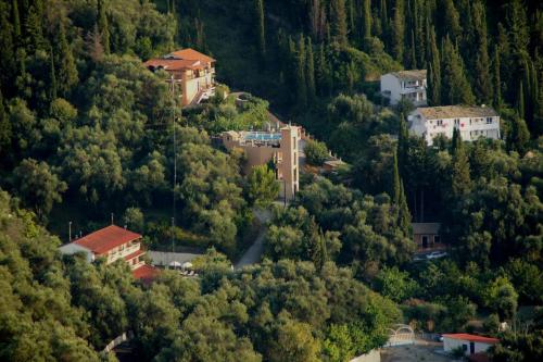 a small town in the middle of a forest at Dina's Paradise in Agios Gordios