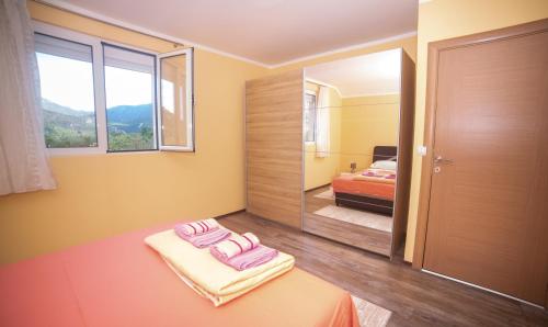 Katil atau katil-katil dalam bilik di Apartment Milena