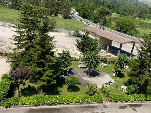 an overhead view of a park with trees and a building at Appartamento Casa Vacanze Chéri in Fiuggi