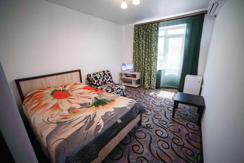 More Solntsa Guest House tesisinde bir odada yatak veya yataklar