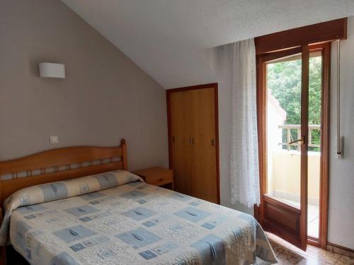 Cama o camas de una habitación en Hotel Villa