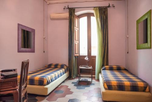 Cama ou camas em um quarto em La Babbajola