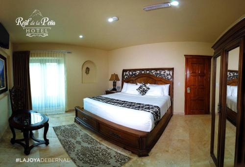 מיטה או מיטות בחדר ב-Hotel Real de La Peña