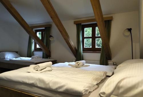 Postel nebo postele na pokoji v ubytování Hotel Alba