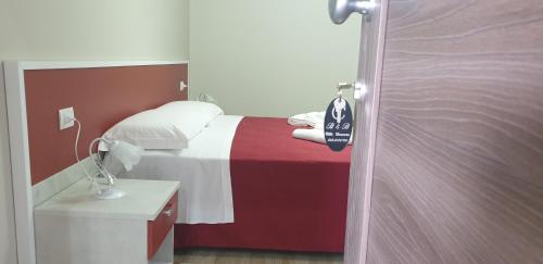 Posteľ alebo postele v izbe v ubytovaní B&B Villa Eleonora Tropea