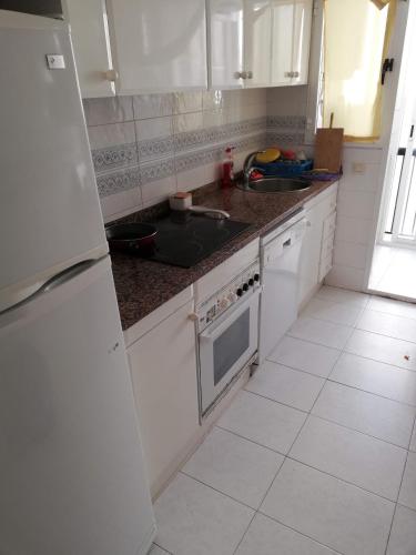 Kuchyň nebo kuchyňský kout v ubytování Residencial Les Motes Solo Familias