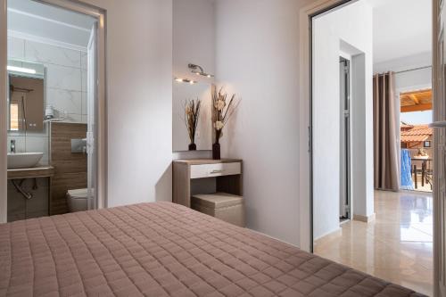 Posteľ alebo postele v izbe v ubytovaní Vasiliki House