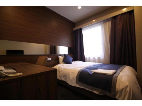 En eller flere senger på et rom på Hotel Il Credo Gifu - Vacation STAY 84585