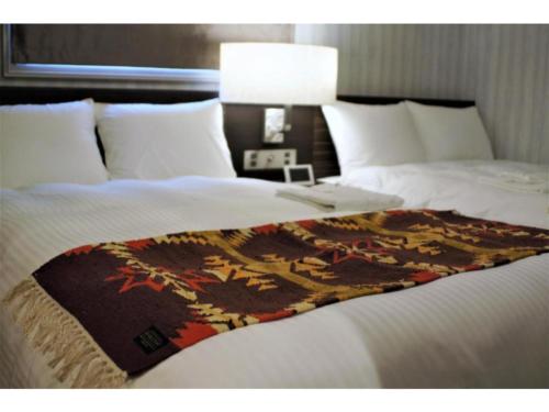 Кровать или кровати в номере Act Hotel Roppongi - Vacation STAY 85368