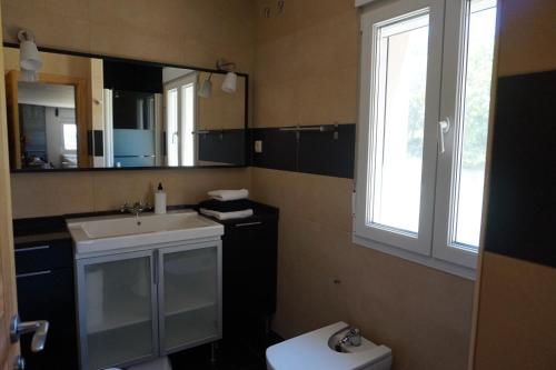 Kuchyň nebo kuchyňský kout v ubytování casa sierra avellaneda avila