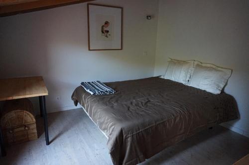 Postel nebo postele na pokoji v ubytování casa sierra avellaneda avila