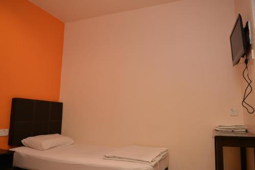 TV a/nebo společenská místnost v ubytování GF WONDERFUL HOTEL
