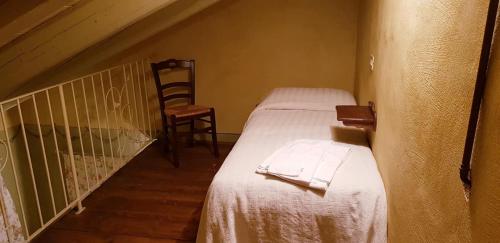 Ένα ή περισσότερα κρεβάτια σε δωμάτιο στο Agriturismo Fiore di Campo