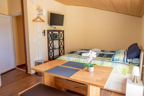 Ένα ή περισσότερα κρεβάτια σε δωμάτιο στο Via Flavia with Common Pool