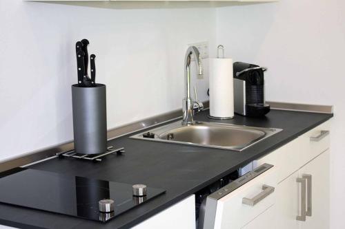 Kuchyň nebo kuchyňský kout v ubytování Cube-House Ferienhaus in Franken