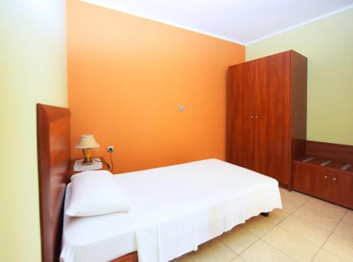 Katil atau katil-katil dalam bilik di Esmeralda Hotel