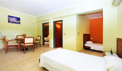 Katil atau katil-katil dalam bilik di Esmeralda Hotel