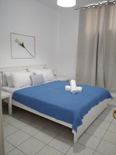 Postel nebo postele na pokoji v ubytování Kavala Home 1