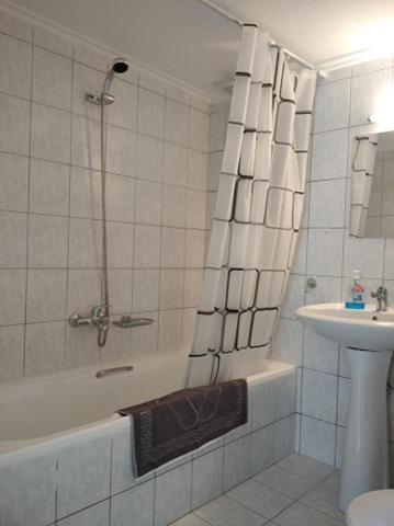 Koupelna v ubytování Kavala Home 1