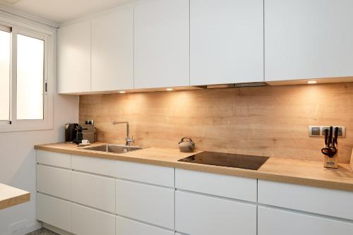 Kuchyňa alebo kuchynka v ubytovaní Quartprimera Apartments