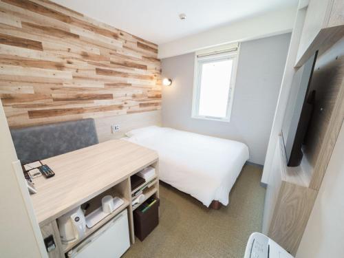 TV a/nebo společenská místnost v ubytování Super Hotel Tokyo JR Kamata Nishiguchi
