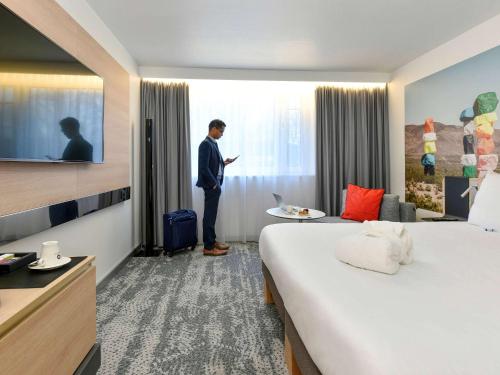 Novotel Wavre Brussels Eastにあるベッド