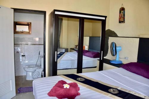 A bed or beds in a room at Angelot Villa