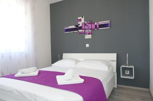 Postel nebo postele na pokoji v ubytování New and modern apartment Karavona Bol