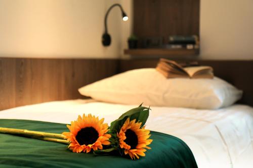 Letto o letti in una camera di Petkovšek Rooms and Apartments
