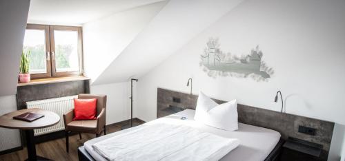 Katil atau katil-katil dalam bilik di Burghotel Pass
