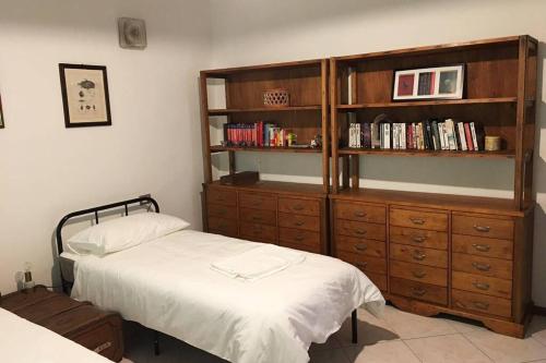 Ένα ή περισσότερα κρεβάτια σε δωμάτιο στο Le Girandole