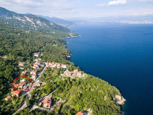an aerial view of a house on a hill by the water at Apartment Sandalj-2 by Interhome in Kraj