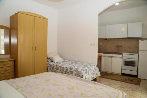 Kuchyň nebo kuchyňský kout v ubytování Apartments Butkovic