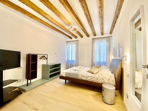 Katil atau katil-katil dalam bilik di Suite House new apartments wi fi Venice island