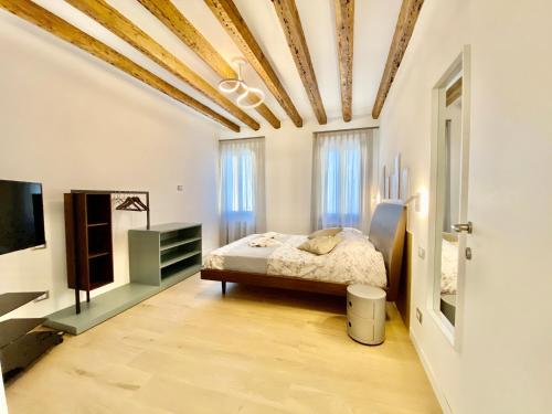 Katil atau katil-katil dalam bilik di Suite House new apartments wi fi Venice island