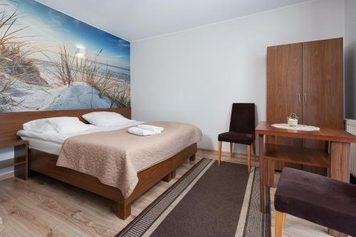 Postel nebo postele na pokoji v ubytování Baltic House