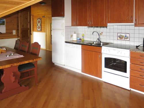 Kuchyň nebo kuchyňský kout v ubytování Holiday Home Tussviki - FJS020 by Interhome