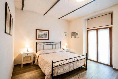 Un pat sau paturi într-o cameră la Casa Vacanze Villa Maria