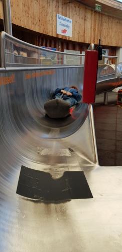 a person is laying on a ride in a inflatable at Haus Seidendorf in Sankt Kanzian