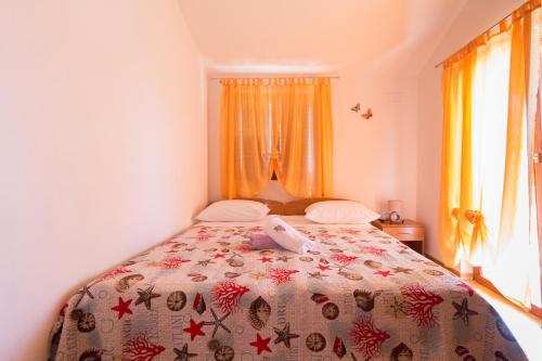 Posteľ alebo postele v izbe v ubytovaní Apartments Casa Nada