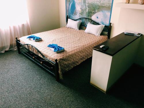 Cama o camas de una habitación en Hotel and Entertaiment Complex Vlada