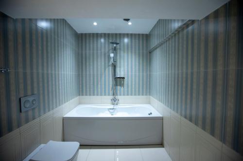 Ванная комната в THE GREEN HOTEL