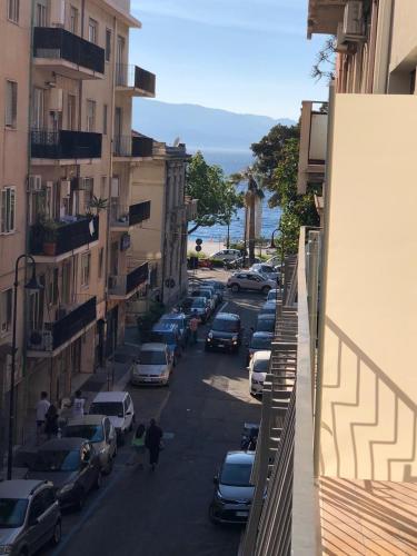 a view of a street with cars parked on the street at B&B Leus Appartment in Reggio Calabria