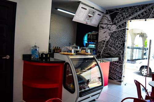 a food cart with a counter in a restaurant at Hotel Dwana in Mazatlán